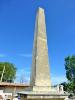 TALL STONE MADE OBELISK.